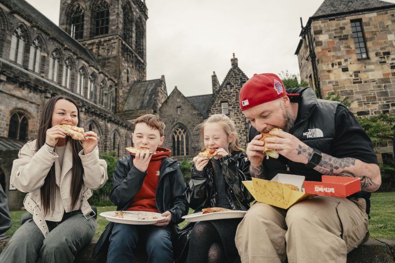 Family eating pizza
